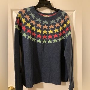 Whimsical star print lambs wool blend sweater from Whitestuff.